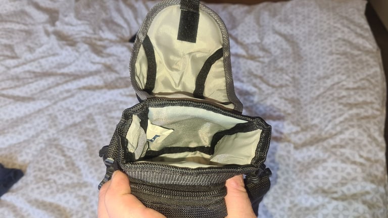 Camera bag/ case with shoulder strap. Multiple compartments. Excellent quality and condition.