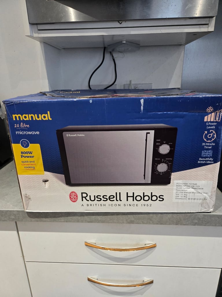 Brand new russell hobbs (rhm2060b) microwave with a small dent on the side (working perfectly)
