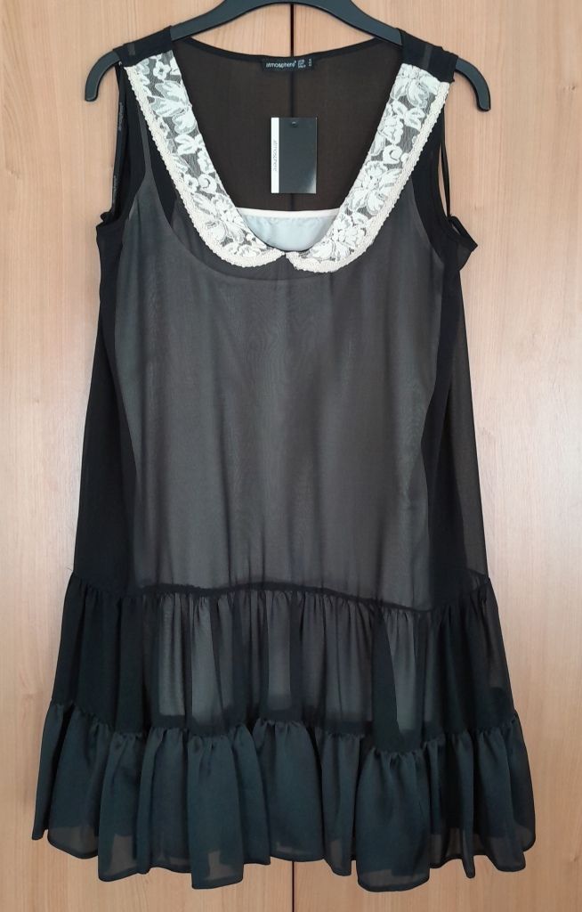 Petty black frilled short dress by Atmosphere.
