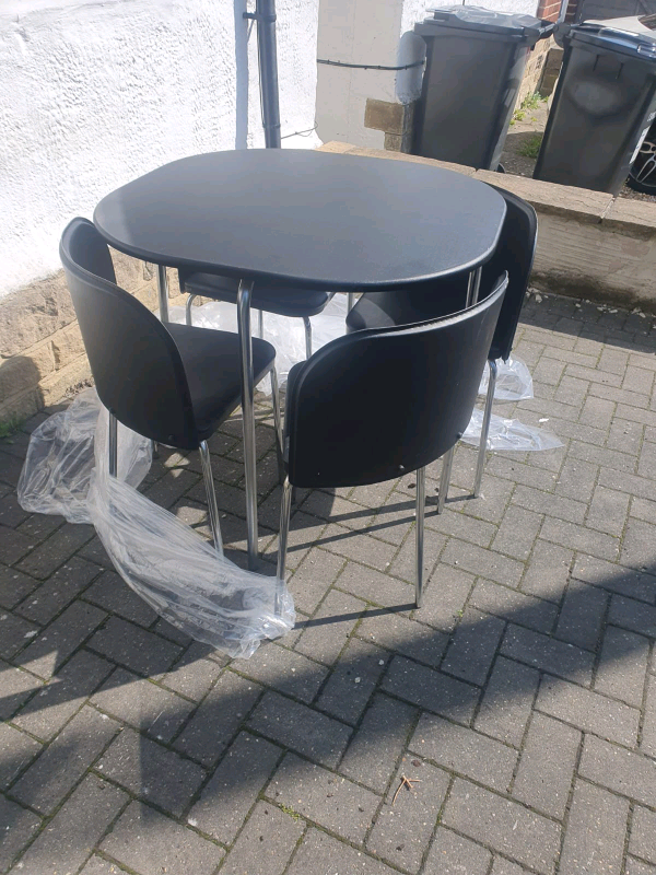 Argos amparo table and chairs hot sale