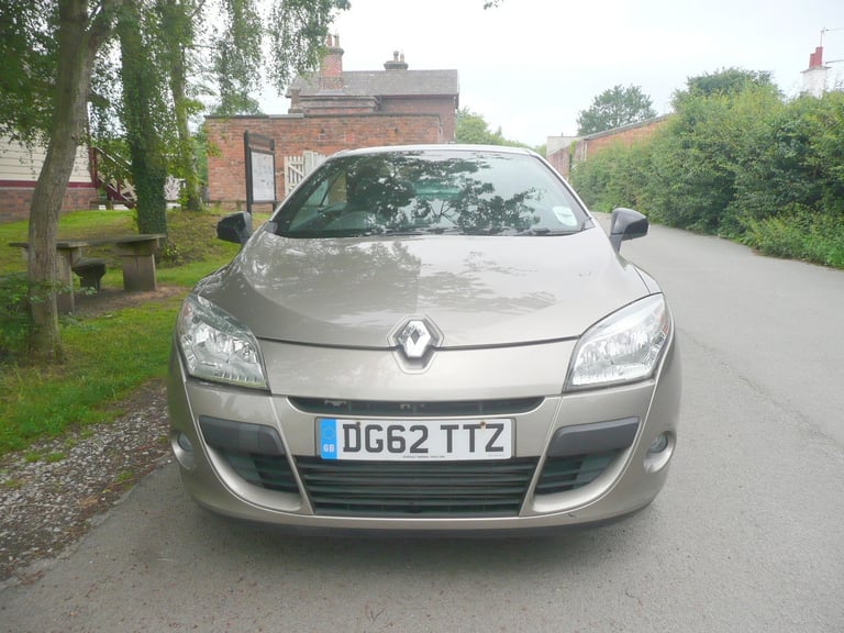 2012, 1.9 diesel Renault Megane convertible.