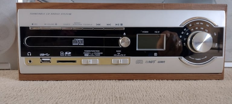 INEXPENSIVE LITTLE MUSIC CENTRE 