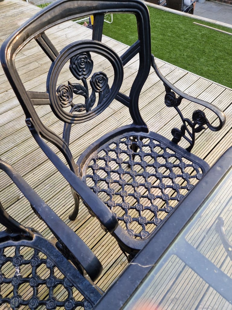 Cast iron table & chairs