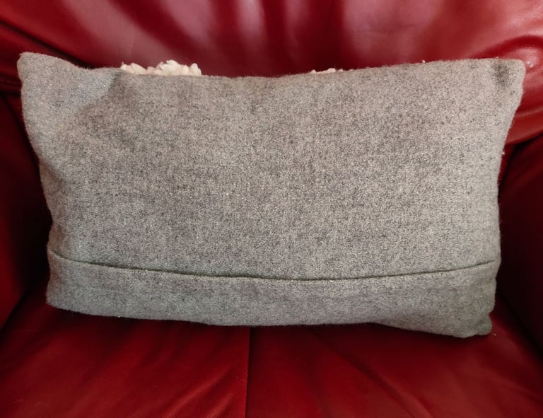 Dunelm Grey and Cream with Eyes and Mouth Cushion