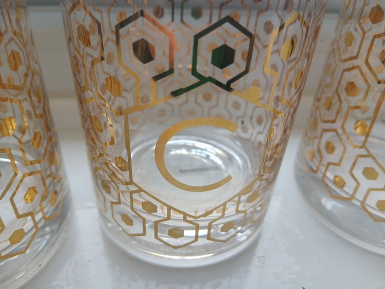 3 lettered glass tumblers with gold style patternation