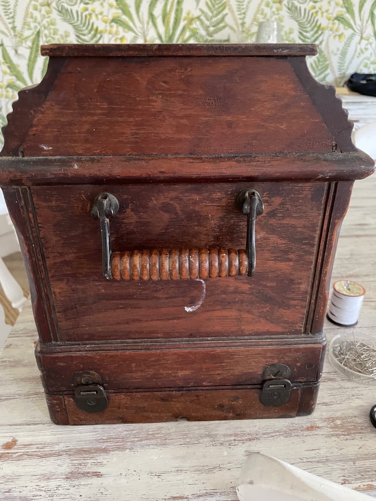 Vintage hand cranked singer sewing machine 