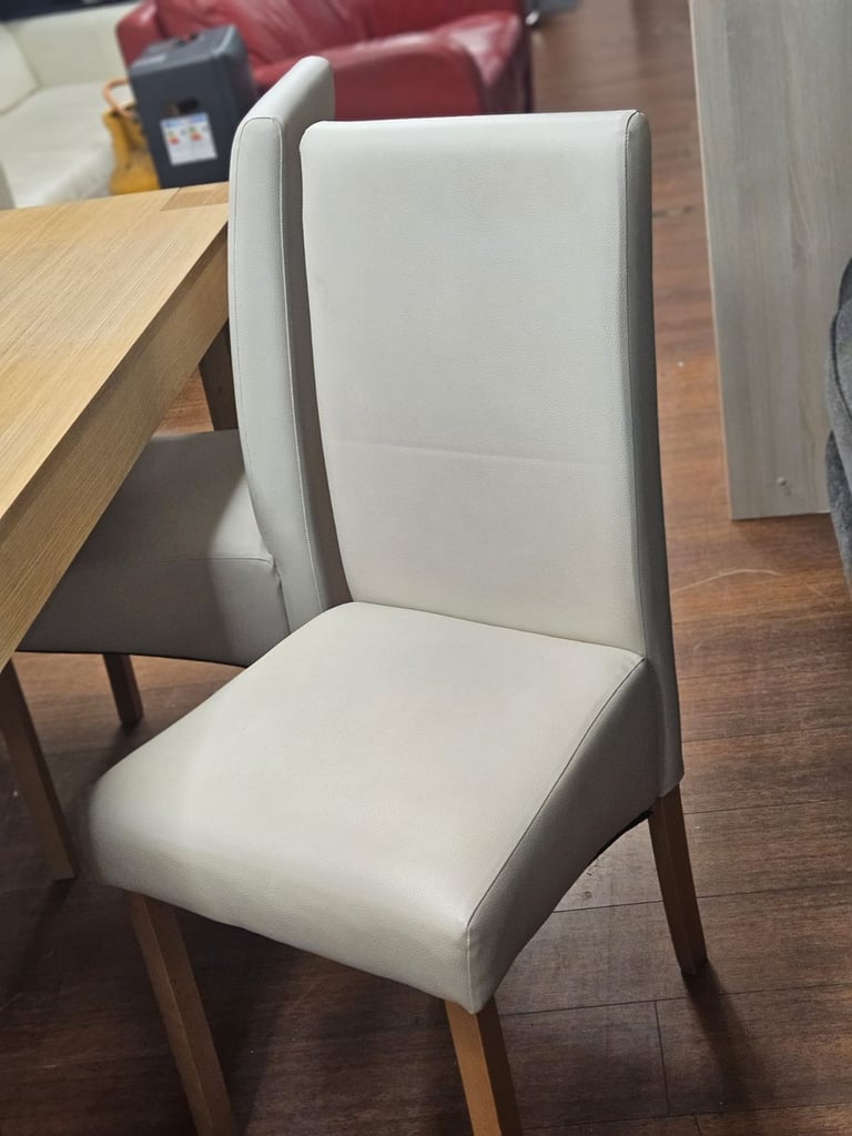 Soild oak table and 4 grey leather chairs 