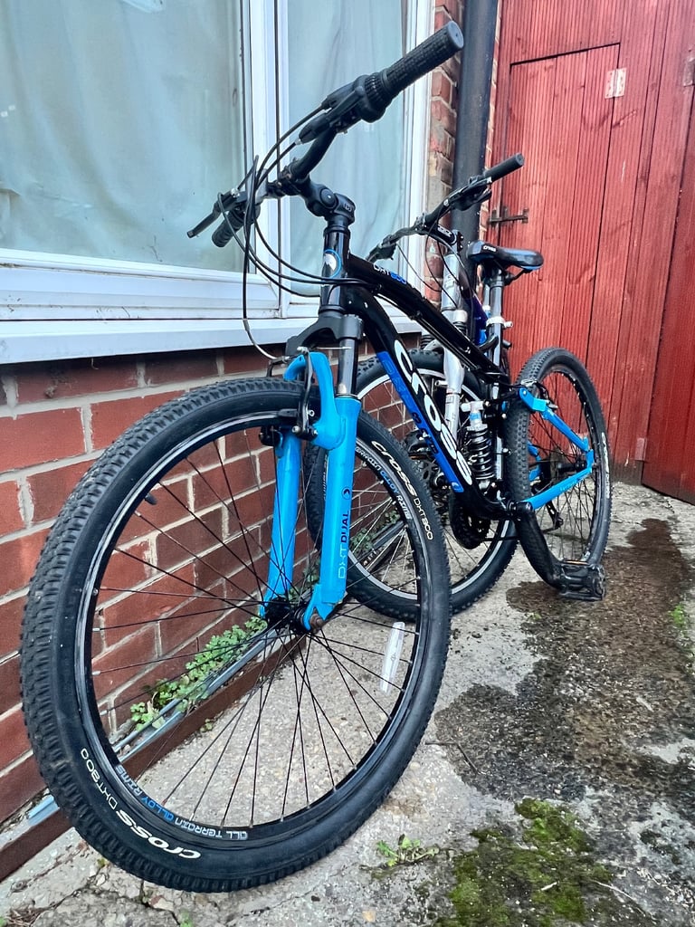 image for Two Adult Mountain Bikes – Cross DHT 300 & GT for sale