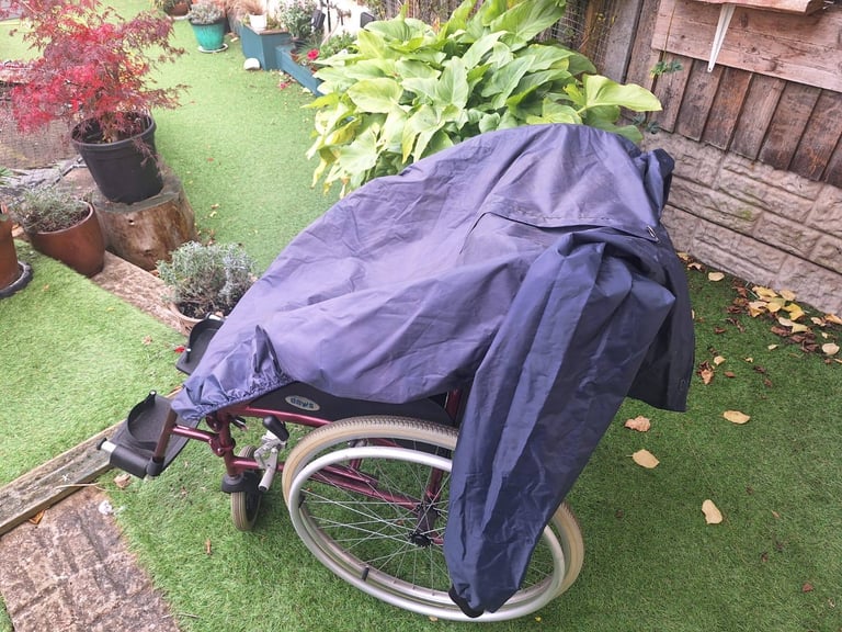 Wheelchair with rain cape