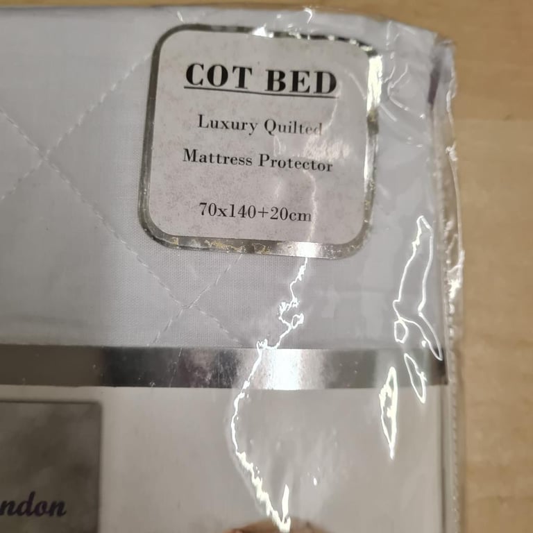 Brand new cot bed mattress protector 