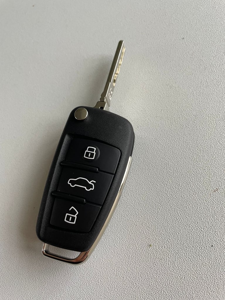 Original Audi 3 button car key. 