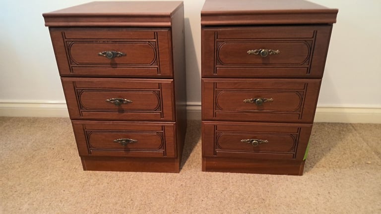 A matching pair of bedside cabinets with 3 drawers in each
