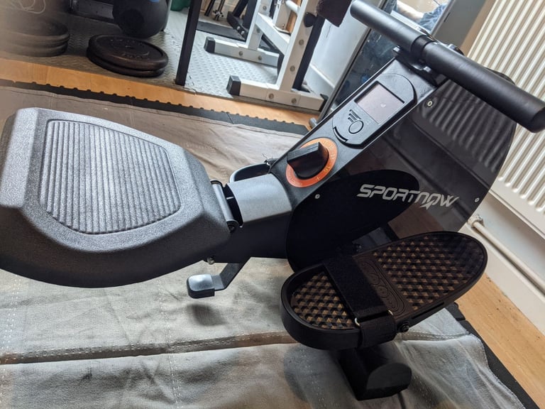 Magnetic rowing machine 