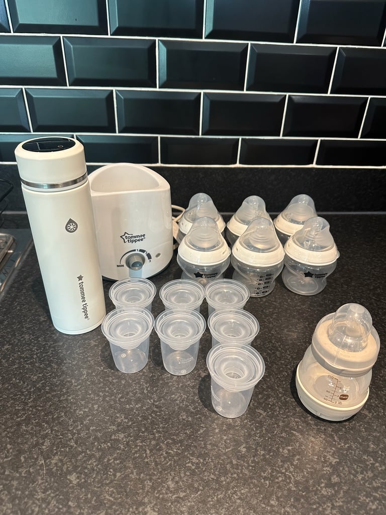 Tommee Tippee Go Prep + bottle warmer and a series of milk bottles 