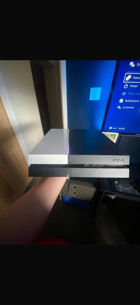 PS4 (comes with power cable and controller)