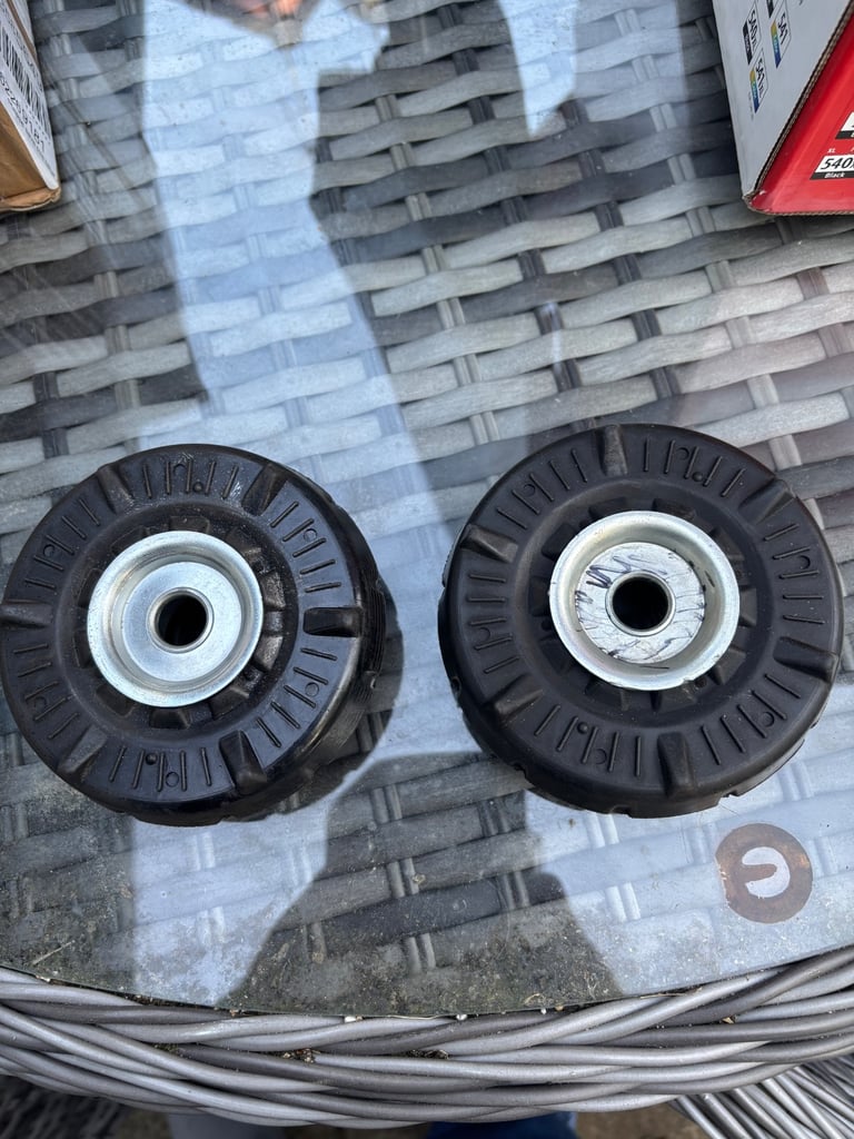 Shock top mount bearings