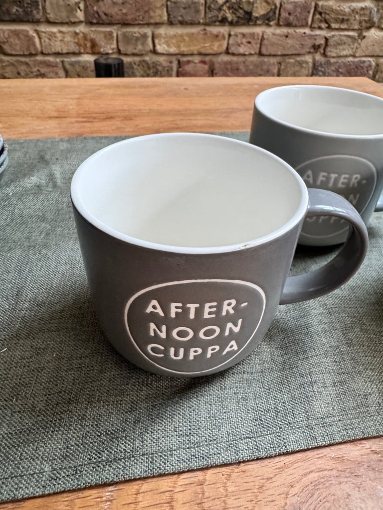 Four colourful mugs