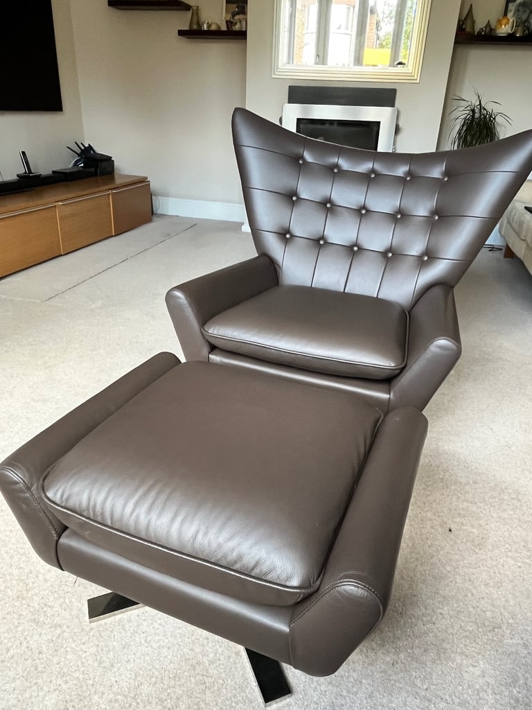 image for Dark brown leather swivel armchair and footstool