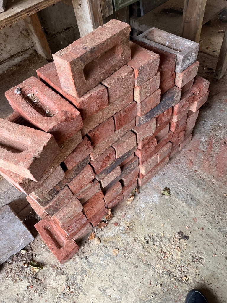 Pike of expensive bricks plus 17 concrete blocks  