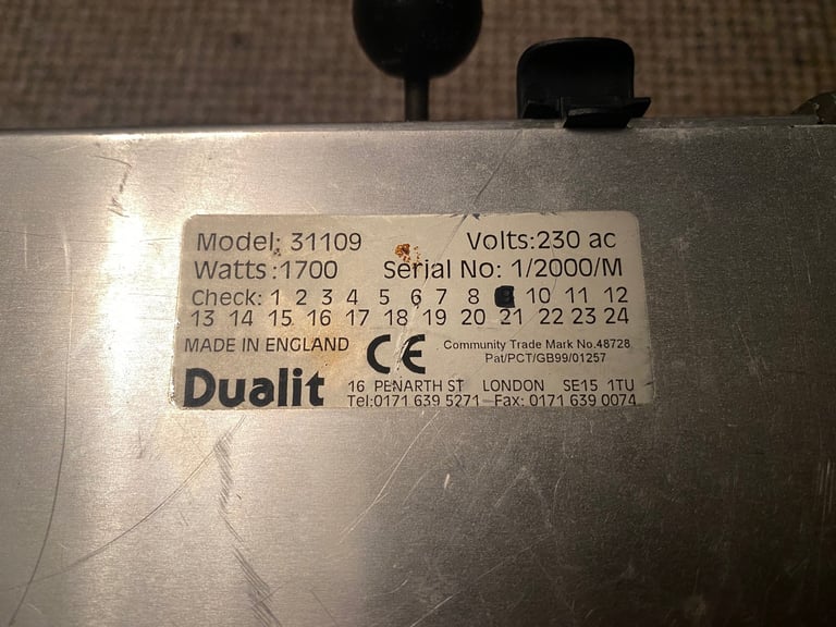 Dualit 3 slice toaster with sandwich holder.