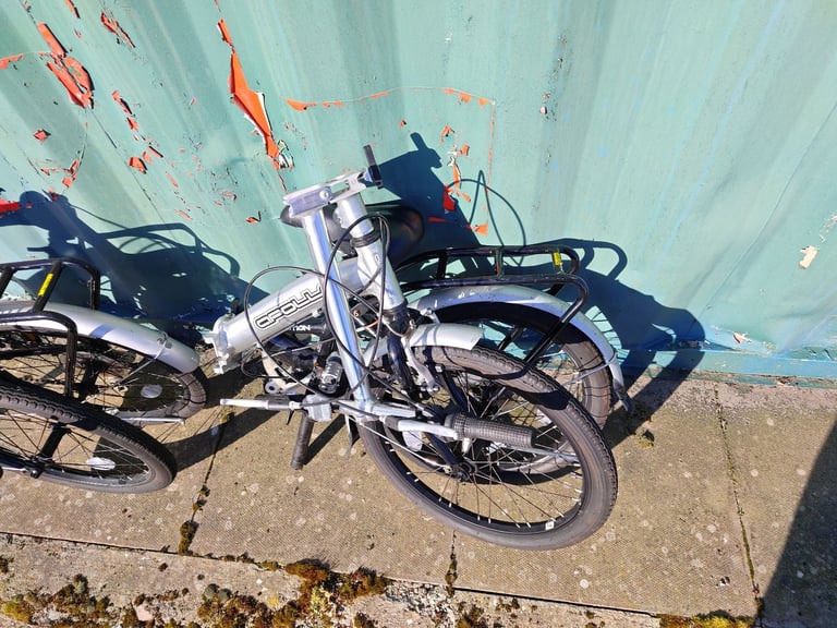 Apollo Transition folding bikes with bags