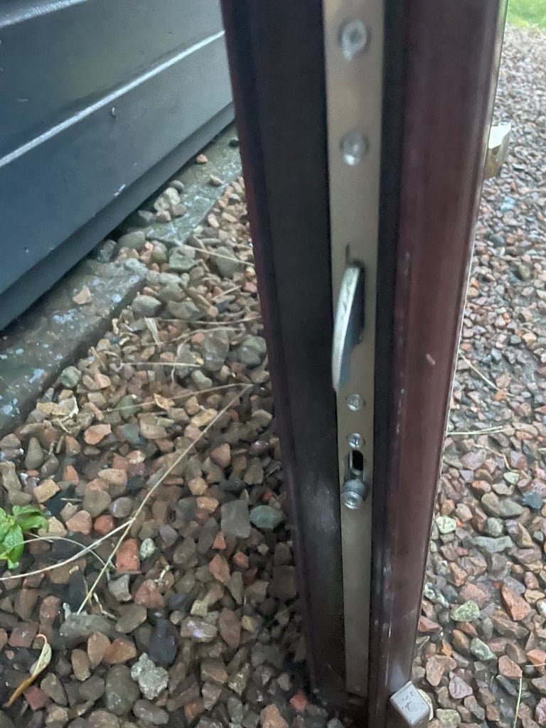 Upvc front door in rosewood 