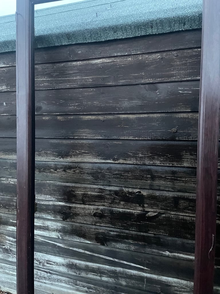 Upvc front door in rosewood 