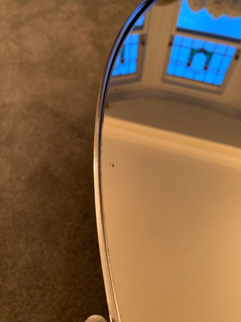 Chrome and mirror round coffee table