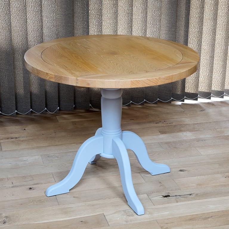 image for Solid oak circular dining table on a grey pedestal base