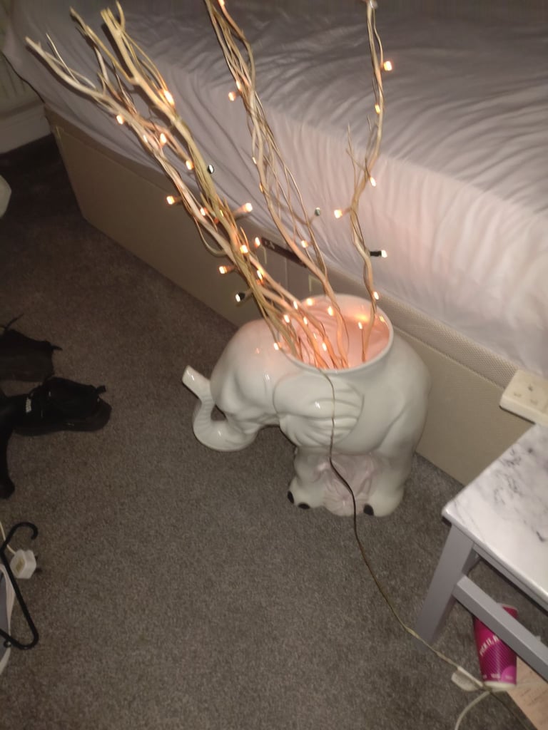 image for Elephant china with 5 twig sticks with lights pick up only 