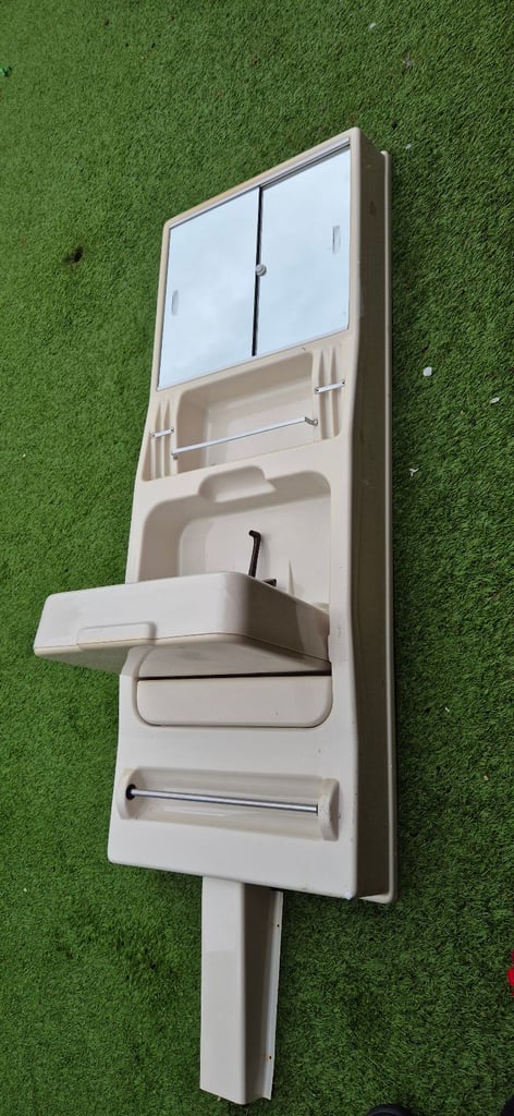 Vanity unit with folding sink for camper caravan motorhome boat.