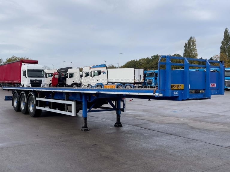 SDC TRI AXLE FLAT BED TRAILER 