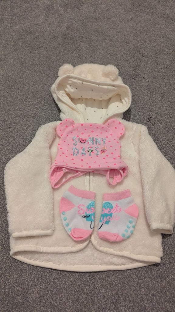 image for Baby white jumper.