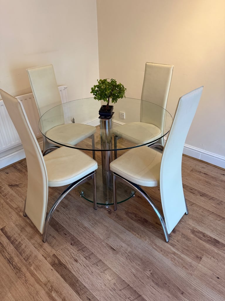 image for Dining table and chairs