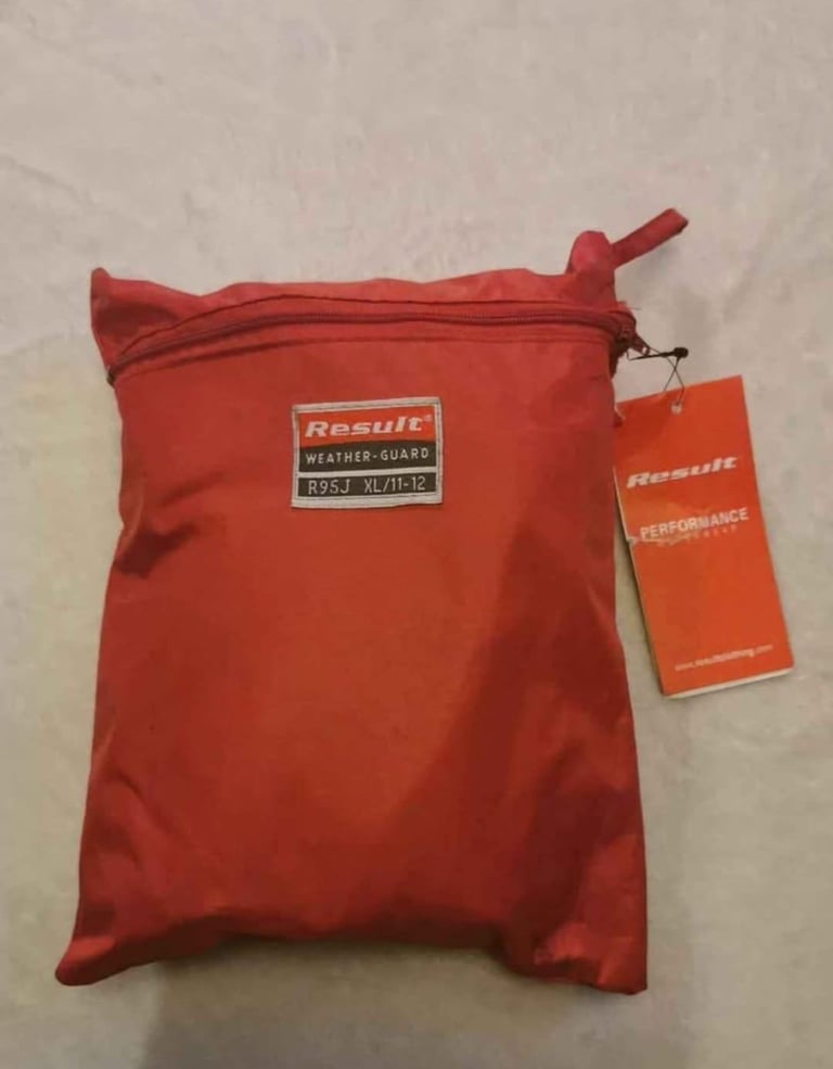 image for Waterproof coat and trousers set. Puddle jump set age 11/12