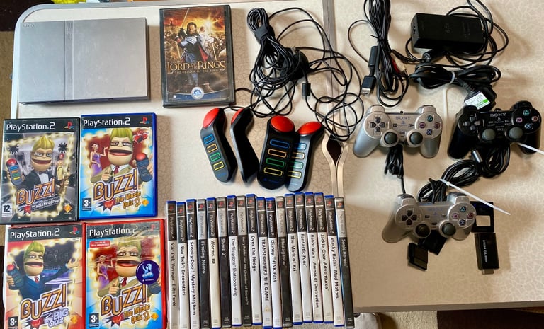 image for PlayStation 2 Silver Bundle 23 Games 3 Controller Memory Card + Buzz controller 