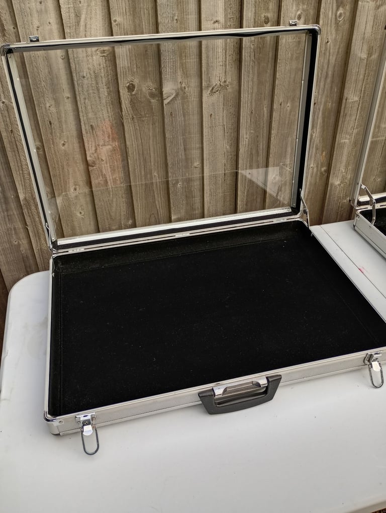 Two large aluminium display cases and foldaway table
