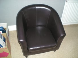 Brown faux leather tub chair. Immaculate condition. Not too heavy for transporting.