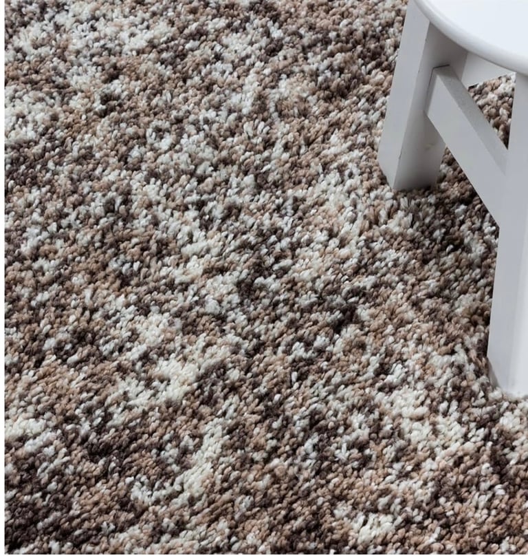 Brand new multicoloured rugs.  £30 each 