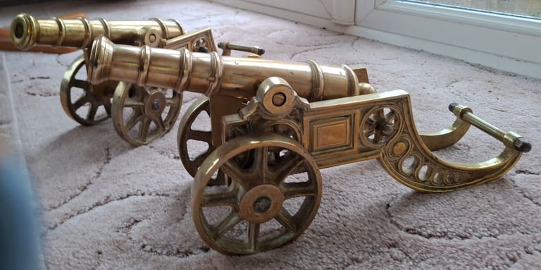 Vintage pair of large brass cannons