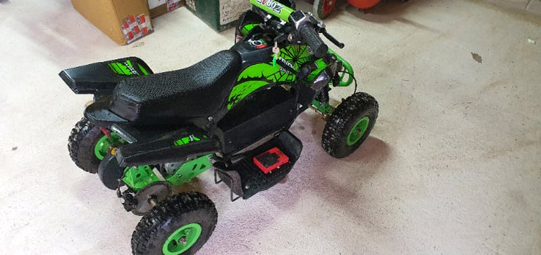 QUAD BIKE (electric ) very quick not toy grade.