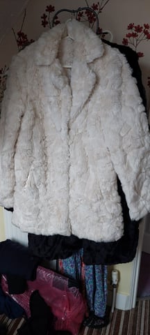 Red herring faux fur coat deals