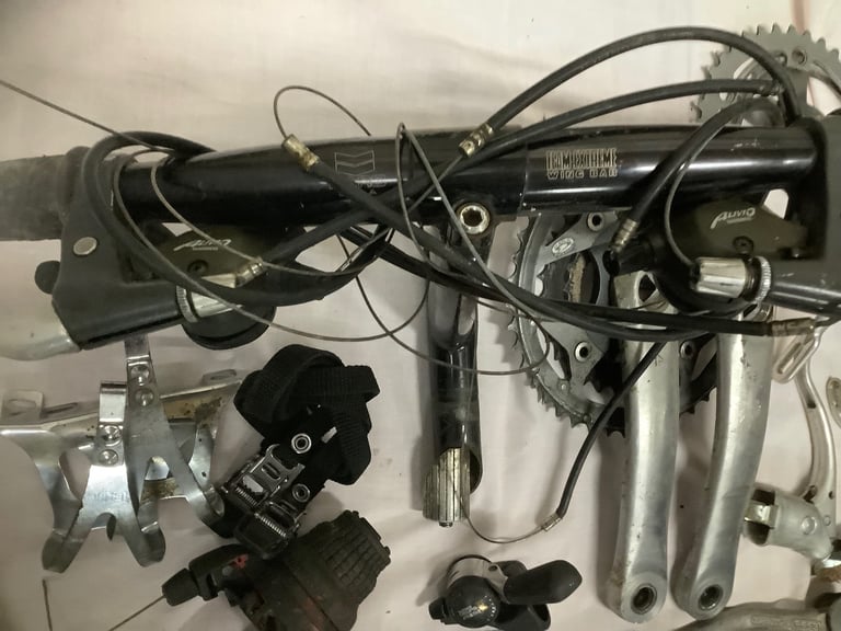 JOB LOT of Bicycle Parts. Handlebars, pumps, brakes, gear shifters and more.