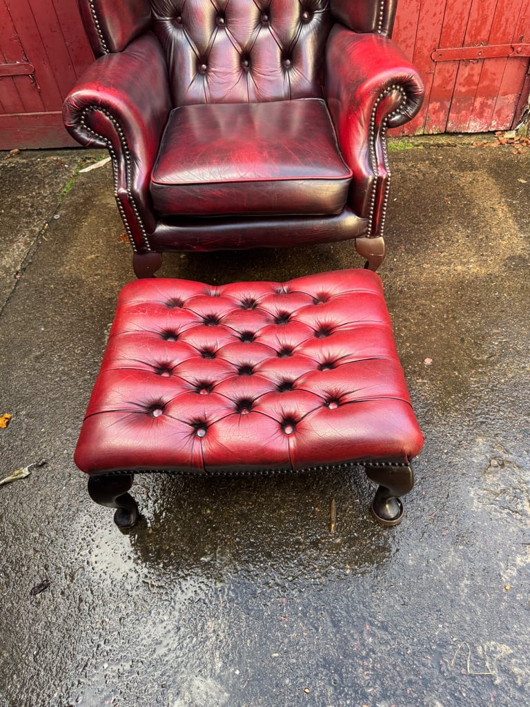 Chesterfield Leather wingback armchair and matching footstool