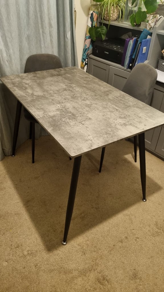 Grey, marble type effect table top.