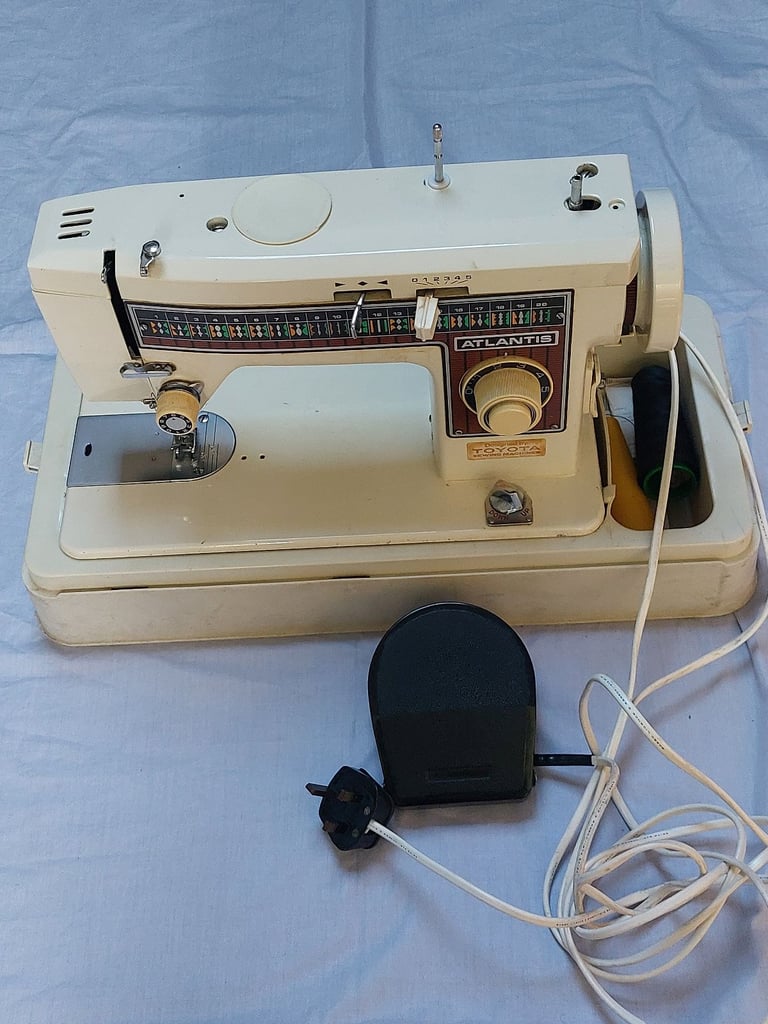 image for Toyota Atlantis Sewing Machine with Foot Pedal.