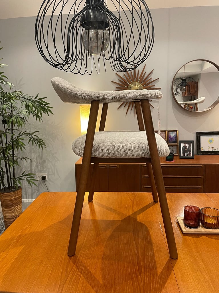 Brand new set of 6 fabric and wood dining chairs.  Never used. 