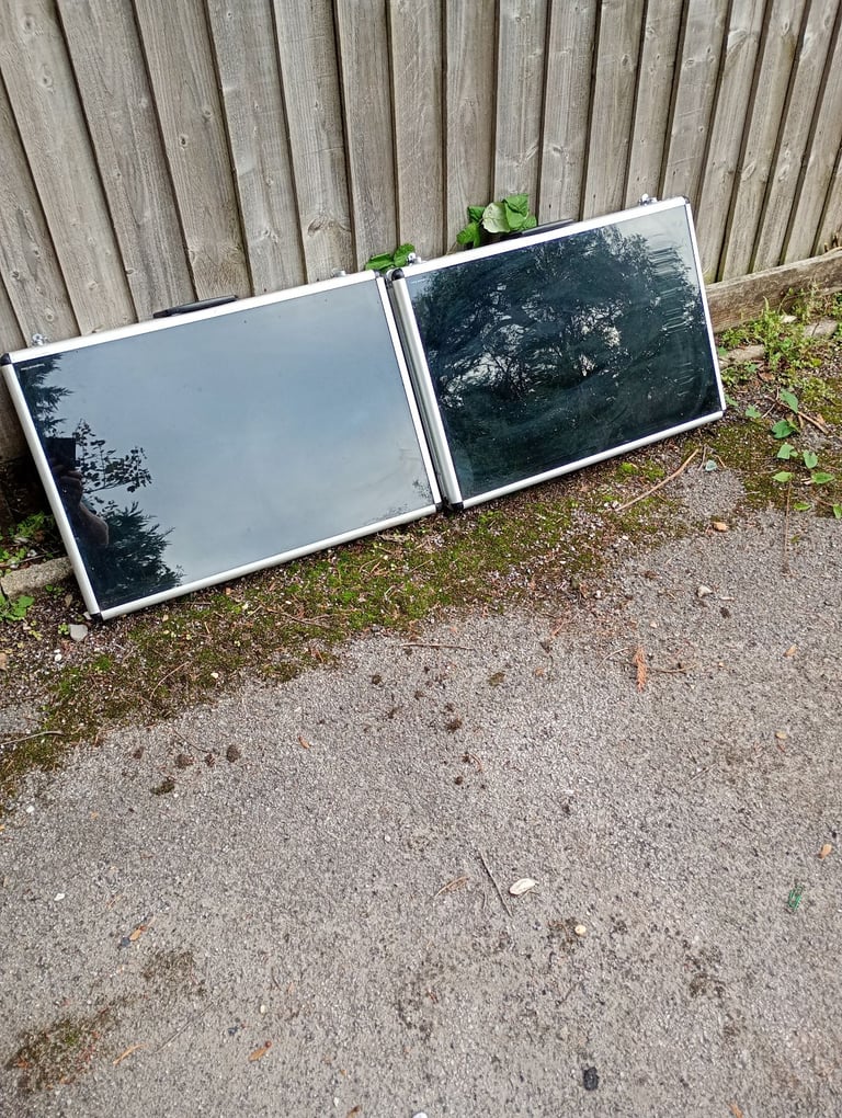 Two large aluminium display cases and foldaway table