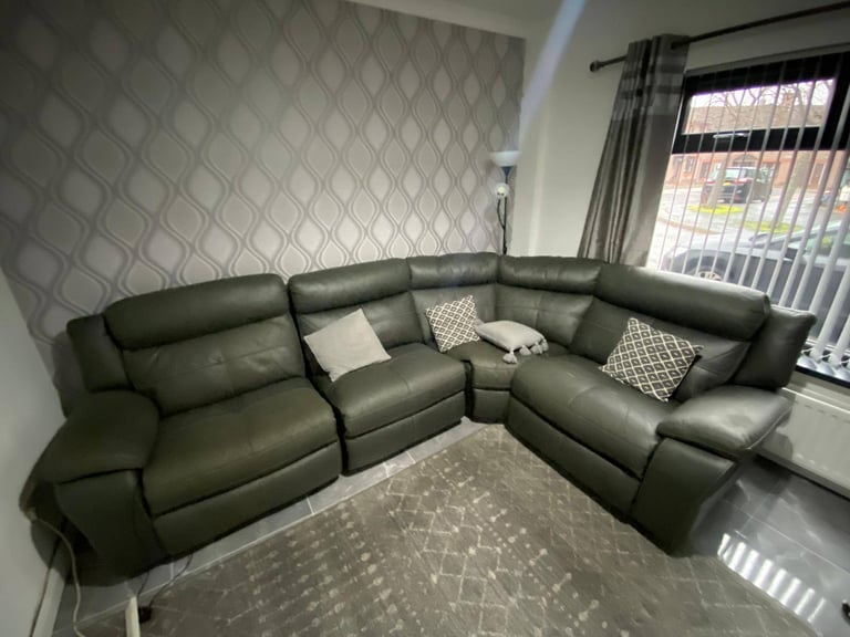 Modern corner group sofa   Some wee signs of wear and the recliner handle etc  £175