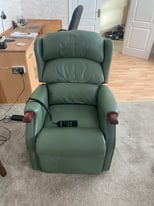 Green leather electric reclining chair 